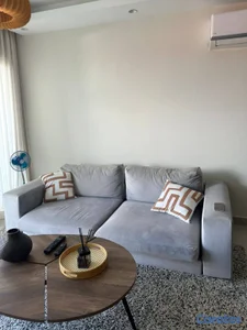 Sofá seccional gris