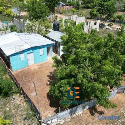solares y terrenos - Se vende solar con 230 metros y dos casitas de mad 4