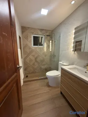 apartamentos - vendo apartamento los cacicazgos en la enrriquillo tres habitaciones 2.5 baños  12