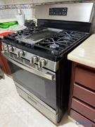 cocina - Vendo estufa General Electric 4 hornillas, plancha y horno, buenas condiciones.