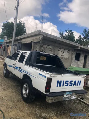 jeepetas y camionetas - De venta camioneta de gasoil Nissan Urvan RD$400,0 2