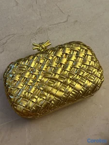 cartera dorada bottega venetta de nudo