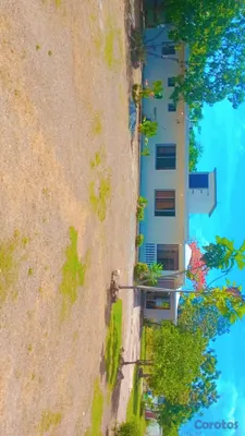 casas vacacionales y villas - 🏡🔥 ¡OPORTUNIDAD ÚNICA EN JUAN DOLIO H3! CASA EN VENTA CON AMPLIO TERRENO Y Tít 3