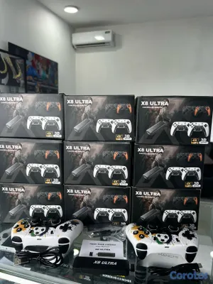 consolas y videojuegos - Gamestick x8 ultra con 2 controles recargables y más de 40 mil juegos  20