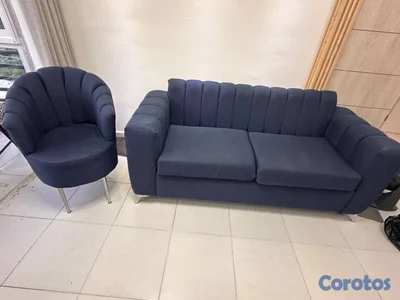 Sofa azul con butaca
