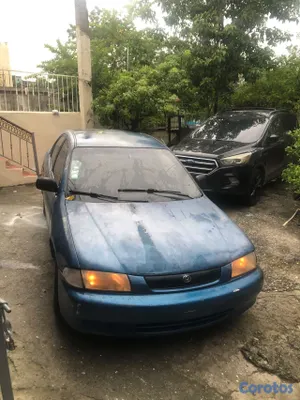 carros - Mazda 323 regalado en 50 mil negociable 2