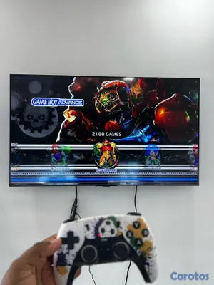 consolas y videojuegos - Gamestick x8 ultra con 2 controles recargables y más de 40 mil juegos  14