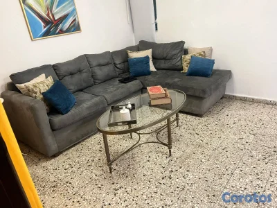 Sofá en L tapizado