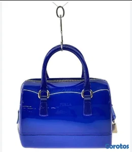 Hermosa Cartera en PVC marca furla 