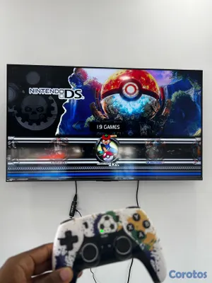 consolas y videojuegos - Gamestick x8 ultra con 2 controles recargables y más de 40 mil juegos  6