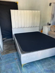 cama tapizada de 60 