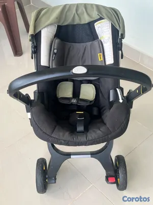 coches y sillas - Coche Doona con base y almohadas de recién nacido 6