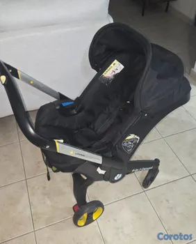 coches y sillas - Coche tipo doona + base original