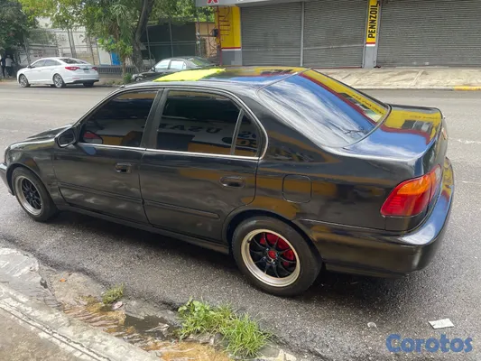carros - vendo Honda Civic 1997-1999 está perfecto condición tiene Haire motor nítido  7