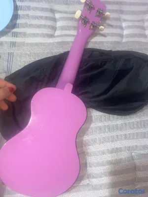 instrumentos musicales - VENDO UQUELELE, Y RAQUETA PROFESIOANL DE TENNIS.  8