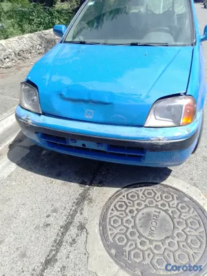 carros - vendo como honda logo chocado, daños menores  7
