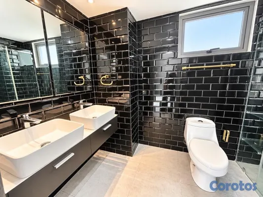 apartamentos - vendo ensanche naco piso 6 dos habitaciones con su baño dos parqueos techados  3