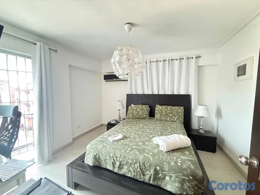 apartamentos - vendo PH ensanche Quisqueya dos niveles tres habitaciones dos parqueos terraza  15