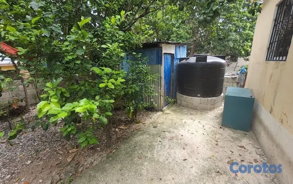 casas - Casa titulada en Quisqueya, 4 hab. y solar 490 m² 2