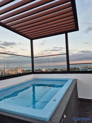 apartamentos - vendo amuebaldo la Julia una habitación 1.5 baños parqueo área de lavado  11