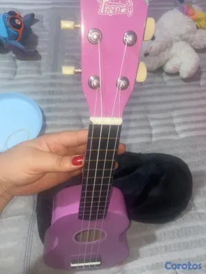instrumentos musicales - VENDO UQUELELE, Y RAQUETA PROFESIOANL DE TENNIS.  6