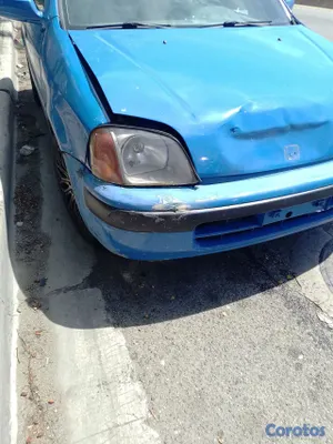 carros - vendo como honda logo chocado, daños menores  4