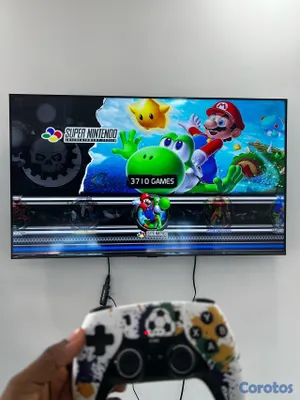 consolas y videojuegos - Gamestick x8 ultra con 2 controles recargables y más de 40 mil juegos  12
