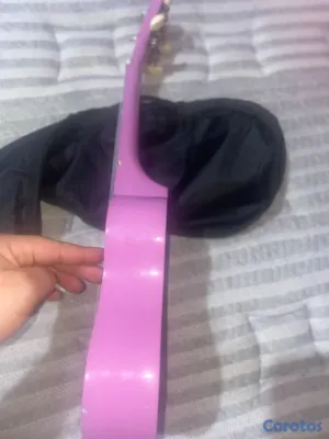 instrumentos musicales - VENDO UQUELELE, Y RAQUETA PROFESIOANL DE TENNIS.  2