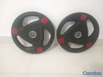 Artículos Deportivos - Set de discos de 20KG olímpicos.