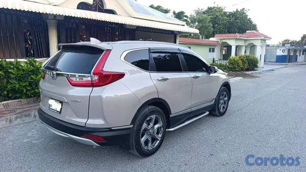 jeepetas y camionetas - Honda crv en buen estado semi nueva  7