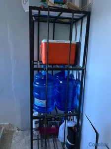 se vende Anaquel de 12 botellones de agua 
