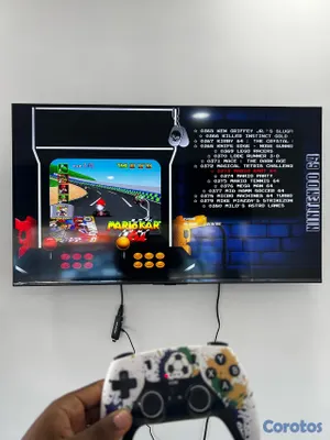 consolas y videojuegos - Gamestick x8 ultra con 2 controles recargables y más de 40 mil juegos  3