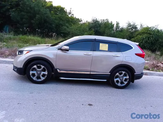 jeepetas y camionetas - Honda crv en buen estado semi nueva  9