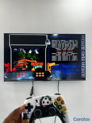 consolas y videojuegos - Gamestick x8 ultra con 2 controles recargables y más de 40 mil juegos  13