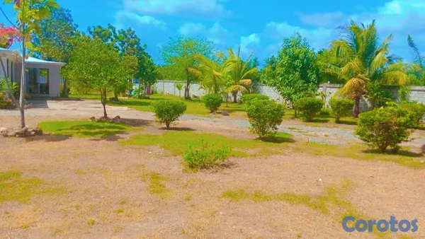 casas vacacionales y villas - 🏡🔥 ¡OPORTUNIDAD ÚNICA EN JUAN DOLIO H3! CASA EN VENTA CON AMPLIO TERRENO Y Tít 9