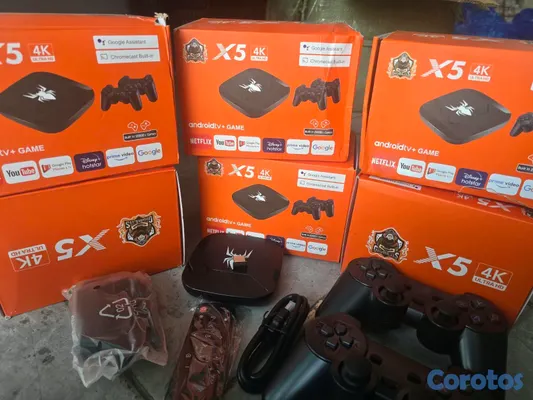 consolas y videojuegos - Tv box mas juegos 3 controles inalambricos 2 de juego y 1 para el tv box 3