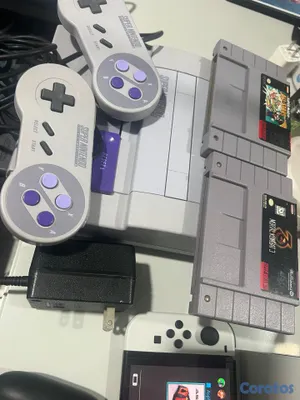 consolas y videojuegos - Vendo súper Nintendo y Nintendo Swicht juntos nada 2