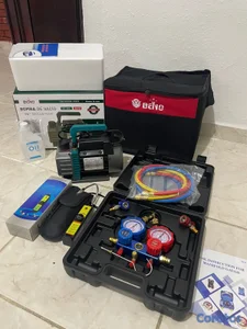kit de bomba de vacío y manómetro