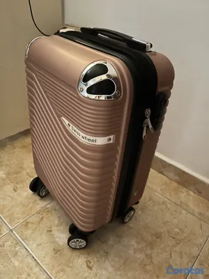carteras y maletas - Carry-on (artículo personal) rosada con ruedas removibles  2