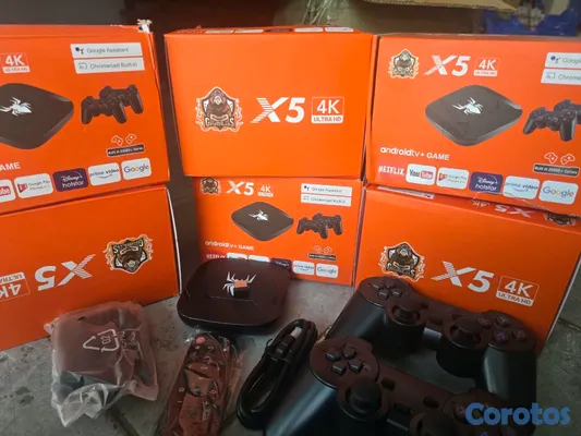consolas y videojuegos - Tv box mas juegos 3 controles inalambricos 2 de juego y 1 para el tv box 7
