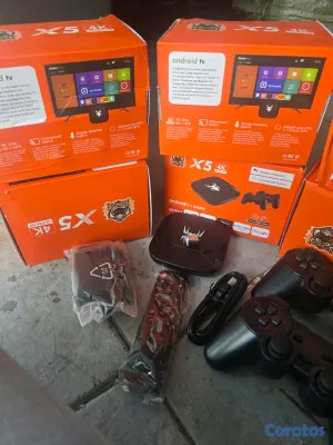 consolas y videojuegos - Tv box mas juegos 3 controles inalambricos 2 de juego y 1 para el tv box 2