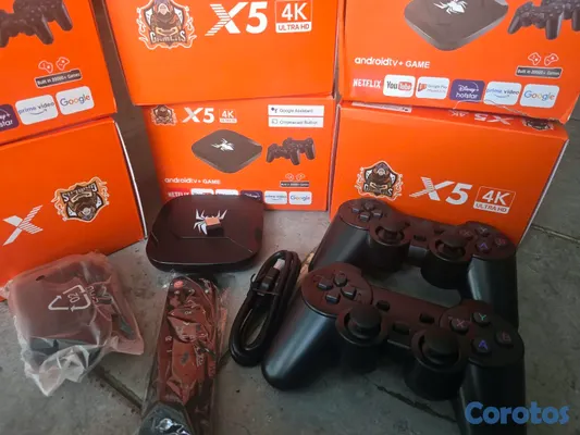 consolas y videojuegos - Tv box mas juegos 3 controles inalambricos 2 de juego y 1 para el tv box 6
