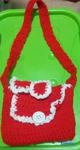 VENDO CARTERITA TEJIDA A MANO PARA NIÑAS.