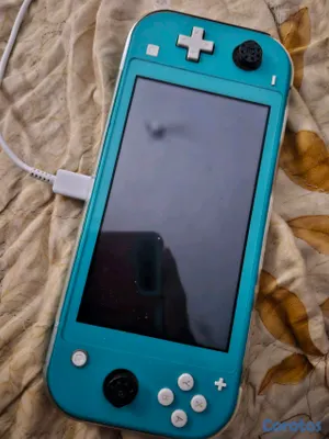 consolas y videojuegos - Vendo Switch Lite con magia 6