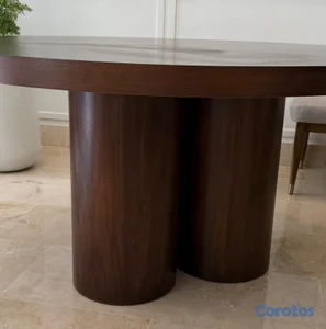 Mesa de comedor redonda•base escultórica de dos columnas