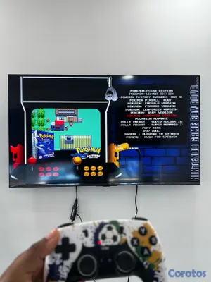 consolas y videojuegos - Gamestick x8 ultra con 2 controles recargables y más de 40 mil juegos  15