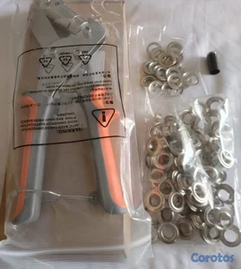 remachadora de ojales metálicos.