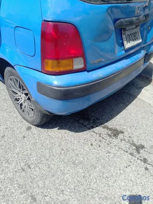 carros - vendo como honda logo chocado, daños menores  2