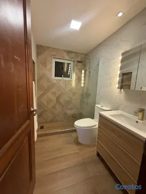 apartamentos - vendo apartamento los cacicazgos en la enrriquillo tres habitaciones 2.5 baños  6
