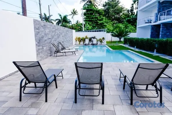 apartamentos - Hermoso apartamento amueblado con jardín y piscina. 4